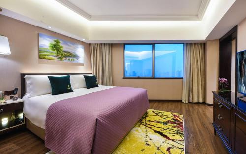 Imagen de la habitación del Hotel MEHOOD LESTIE Hotel (Shanghai Xujiahui Wukang Road). Foto 8