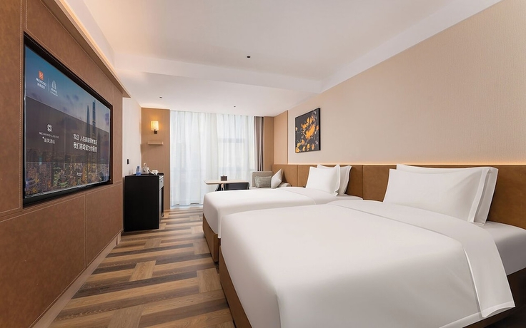 Imagen de la habitación del Hotel MEHOOD LESTIE Qingdao Vientiane. Foto 2