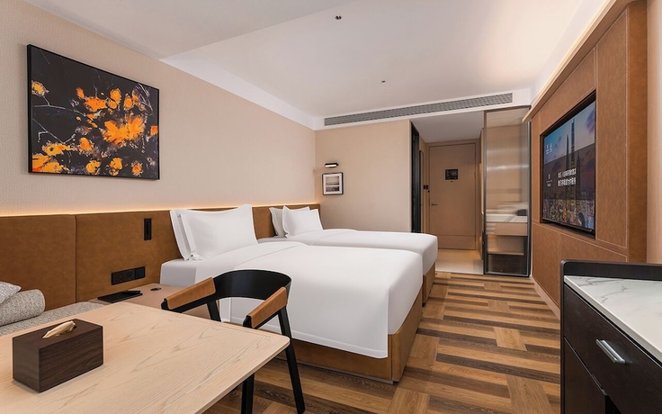 Imagen de la habitación del Hotel MEHOOD LESTIE Qingdao Vientiane. Foto 3