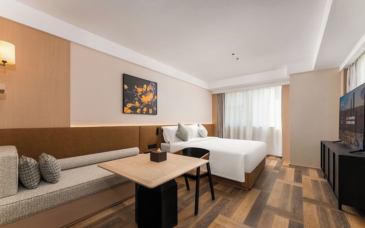 Imagen de la habitación del Hotel MEHOOD LESTIE Qingdao Vientiane. Foto 7