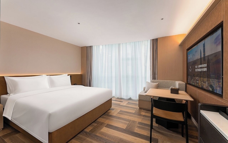 Imagen de la habitación del Hotel MEHOOD LESTIE Qingdao Vientiane. Foto 8