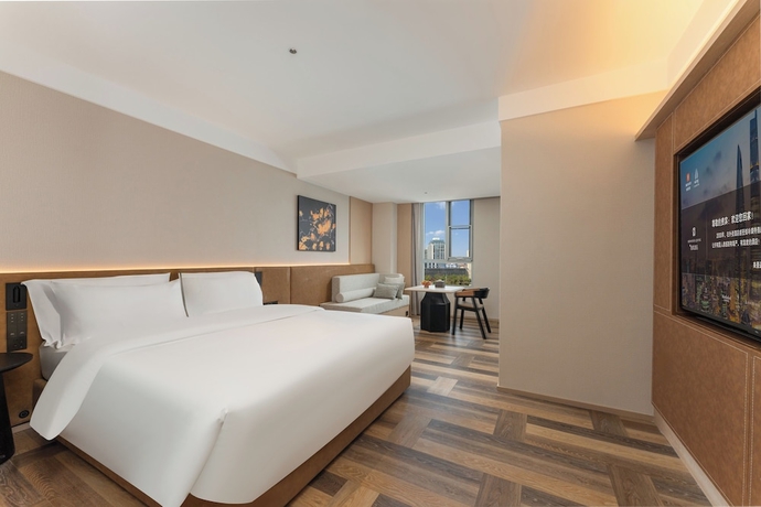 Imagen de la habitación del Hotel MEHOOD LESTIE Qingdao Vientiane. Foto 9
