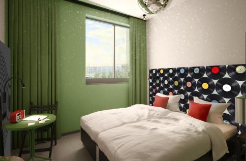 Imagen de la habitación del Hotel MEININGER Hotel Dresden Zentrum. Foto 13