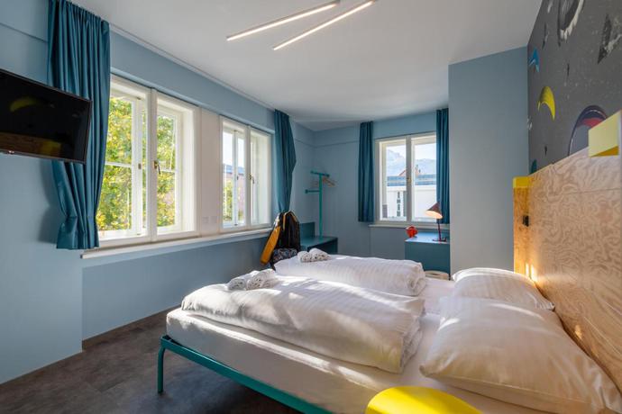 Imagen de la habitación del Hotel MEININGER Innsbruck Zentrum. Foto 6