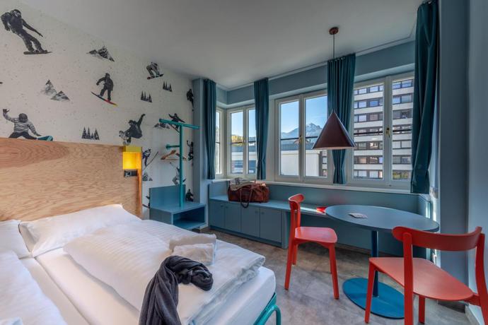 Imagen de la habitación del Hotel MEININGER Innsbruck Zentrum. Foto 10