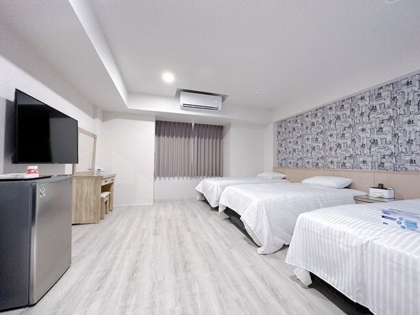 Imagen de la habitación del Hotel MENG JING HOTEL. Foto 13
