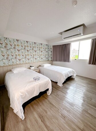 Imagen de la habitación del Hotel MENG JING HOTEL. Foto 15