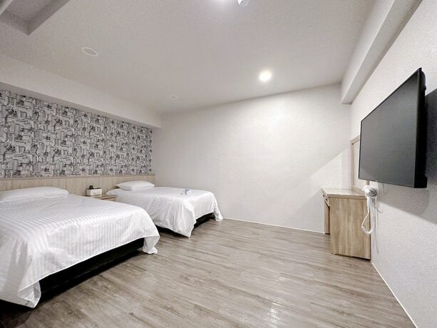 Imagen de la habitación del Hotel MENG JING HOTEL. Foto 16