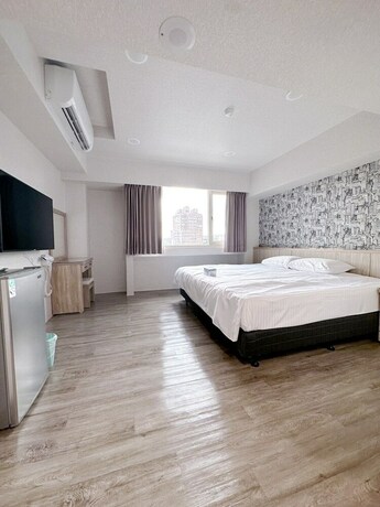 Imagen de la habitación del Hotel MENG JING HOTEL. Foto 17
