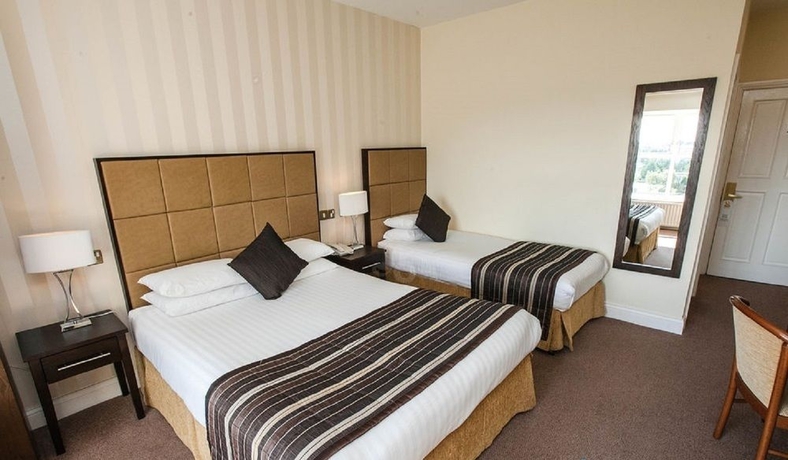 Imagen de la habitación del Hotel MENLO PARK. Foto 8