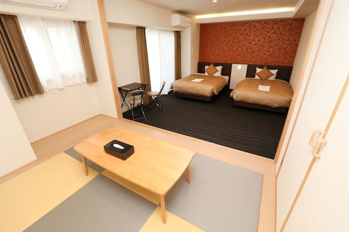 Imagen de la habitación del Hotel MERBABU STAY OSAKA. Foto 7