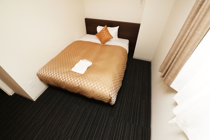 Imagen de la habitación del Hotel MERBABU STAY OSAKA. Foto 10