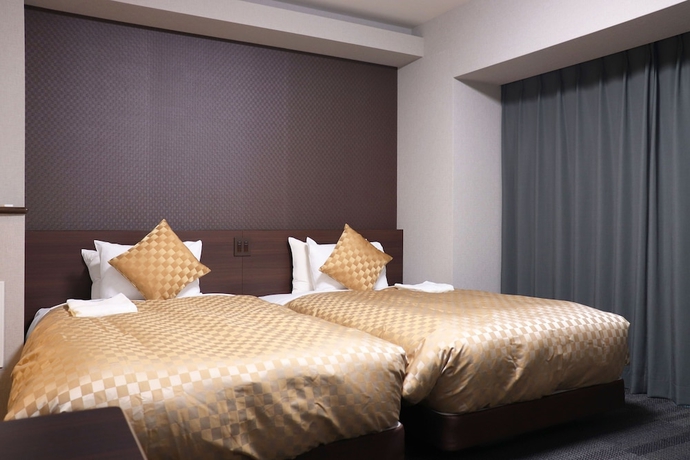 Imagen de la habitación del Hotel MERBABU STAY OSAKA. Foto 12