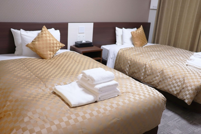 Imagen de la habitación del Hotel MERBABU STAY OSAKA. Foto 15
