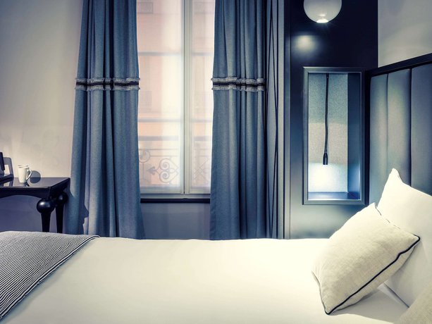 Imagen de la habitación del Hotel MERCURE PARIS ARC DE TRIOMPHE WAGRAM. Foto 11