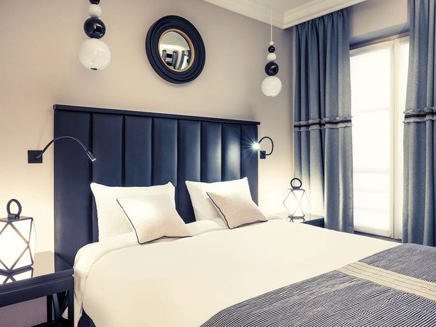 Imagen de la habitación del Hotel MERCURE PARIS ARC DE TRIOMPHE WAGRAM. Foto 14