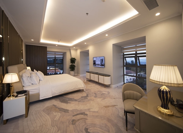 Imagen de la habitación del Hotel MERPERLE DALAT HOTEL. Foto 11