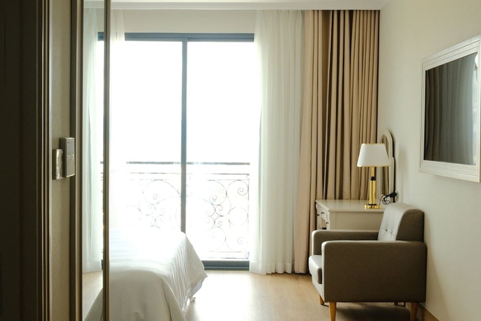 Imagen de la habitación del Hotel MERPERLE DALAT HOTEL. Foto 12