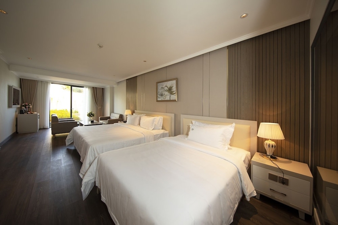 Imagen de la habitación del Hotel MERPERLE DALAT HOTEL. Foto 18