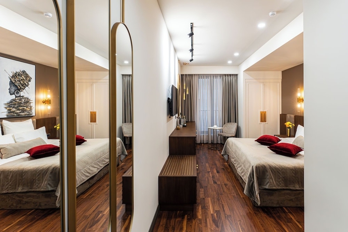 Imagen de la habitación del Hotel METROPOL Club House. Foto 2