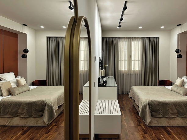 Imagen de la habitación del Hotel METROPOL Club House. Foto 9