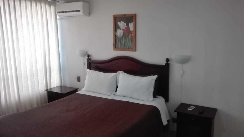 Imagen de la habitación del Hotel MG Apartments Providencia. Foto 2
