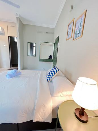 Imagen de la habitación del Hotel MG Casa Inn. Foto 11