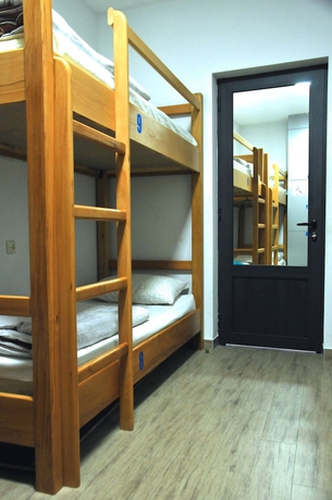 Imagen de la habitación del Hotel MGA Hostel and Tours. Foto 15