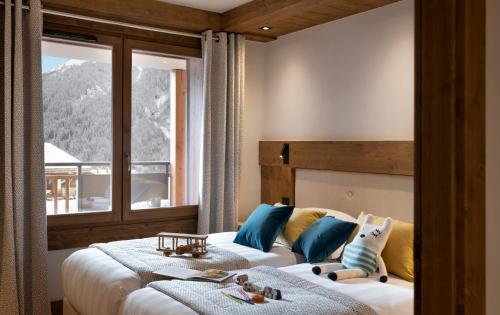 Imagen de la habitación del Hotel MGM H&ocirc;tels & R&eacute;sidences - R&eacute;sidence Chalets de Joy. Foto 20