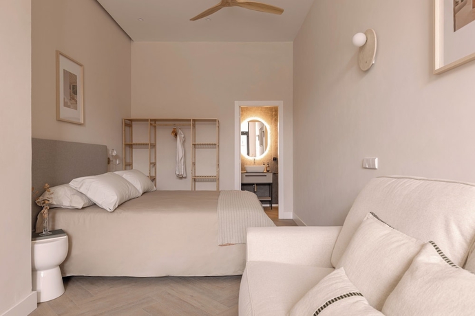 Imagen de la habitación del Hotel MH Apartments Central Valencia. Foto 1