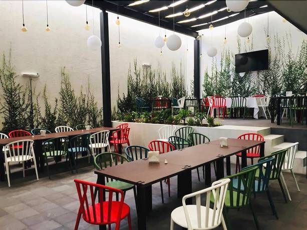 Imagen del bar/restaurante del Hotel MH. Foto 2