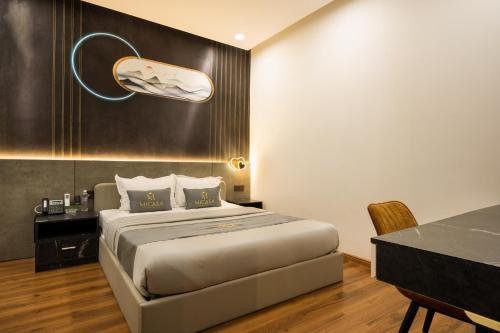 Imagen de la habitación del Hotel MICASA HOTEL. Foto 17