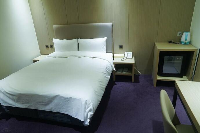 Imagen de la habitación del Hotel MICHI HOTEL LUOONG. Foto 14