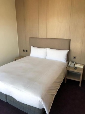 Imagen de la habitación del Hotel MICHI HOTEL LUOONG. Foto 19