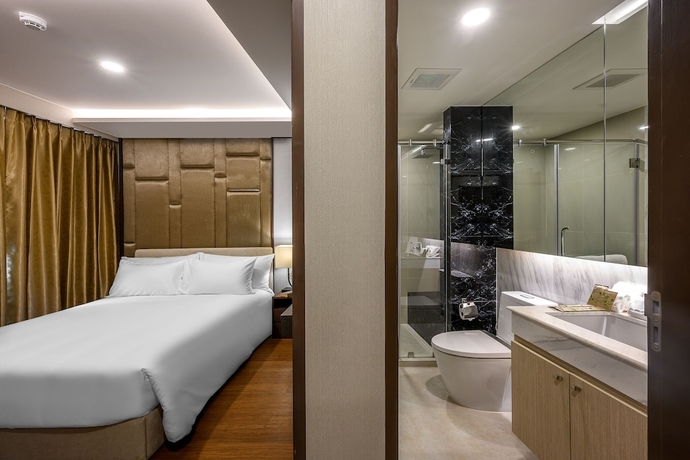 Imagen de la habitación del Hotel MIDA Grande Resort Phuket. Foto 2
