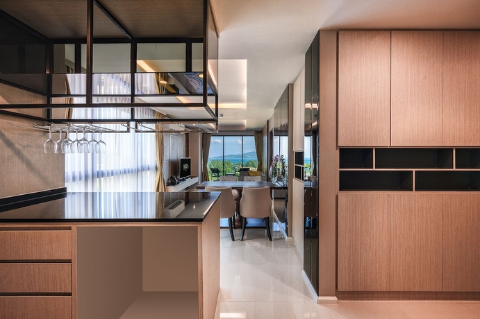 Imagen de la habitación del Hotel MIDA Grande Resort Phuket. Foto 8