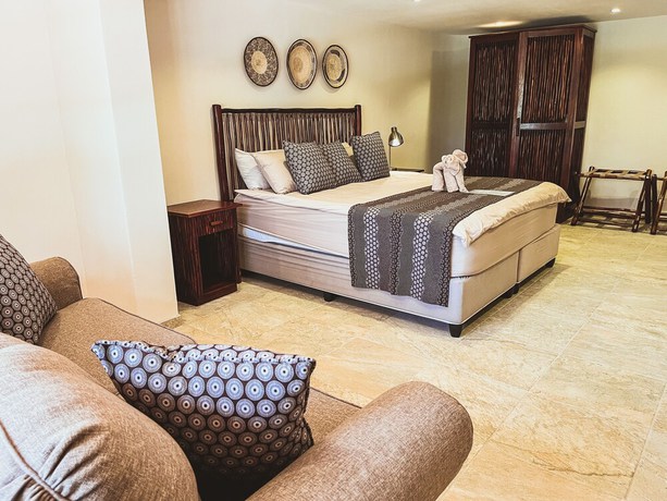 Imagen de la habitación del Hotel MILIMA Big 5 Safari Lodge. Foto 10