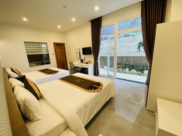 Imagen de la habitación del Hotel MINH CHIEN SUITE. Foto 15