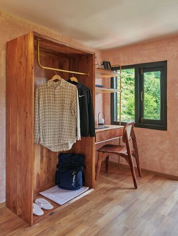 Imagen de la habitación del Hotel MINIMALIST An Eco Farmstay. Foto 10