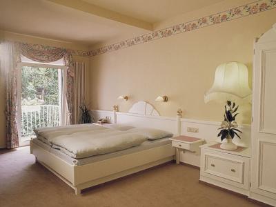 Imagen de la habitación del Hotel MINOTEL ALTE BAUERNSCHANKE. Foto 10