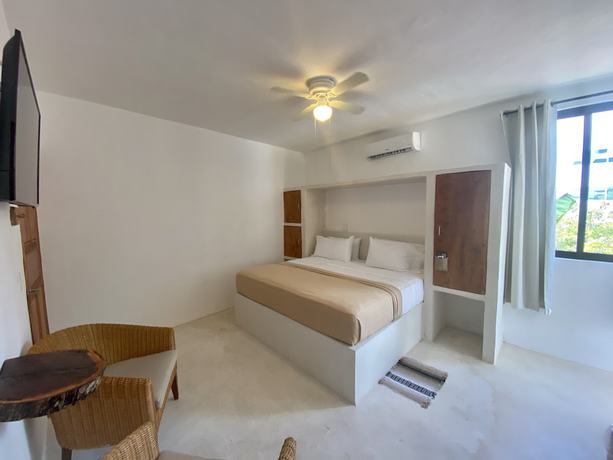 Imagen de la habitación del Hotel MIO Cancún Boutique. Foto 6