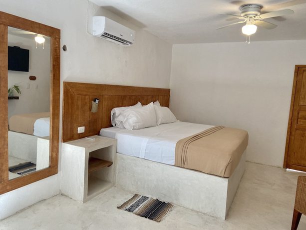 Imagen de la habitación del Hotel MIO Cancún Boutique. Foto 7