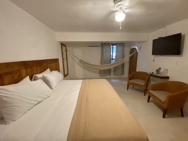 Imagen de la habitación del Hotel MIO Cancún Boutique. Foto 9