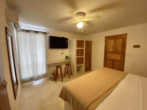 Imagen de la habitación del Hotel MIO Cancún Boutique. Foto 13