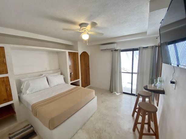 Imagen de la habitación del Hotel MIO Cancún Boutique. Foto 16