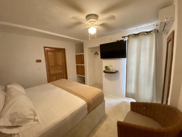 Imagen de la habitación del Hotel MIO Cancún Boutique. Foto 17