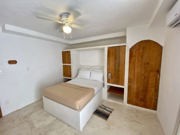 Imagen de la habitación del Hotel MIO Cancún Boutique. Foto 18