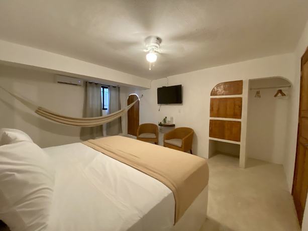 Imagen de la habitación del Hotel MIO Cancún Boutique. Foto 20