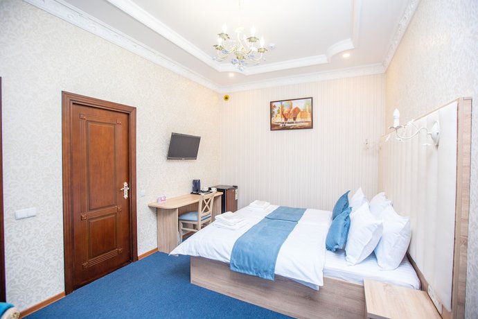Imagen de la habitación del Hotel MIRZO Boutique. Foto 17