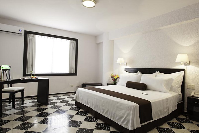 Imagen de la habitación del Hotel MISI&Oacute;N M&Eacute;RIDA. Foto 4